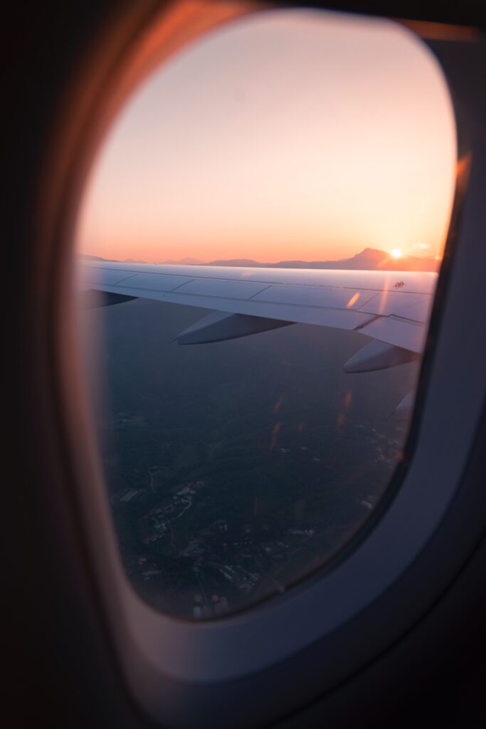 airplane-window-view-sunset